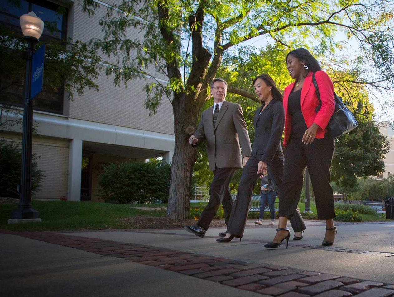 Creighton staff walking on campus